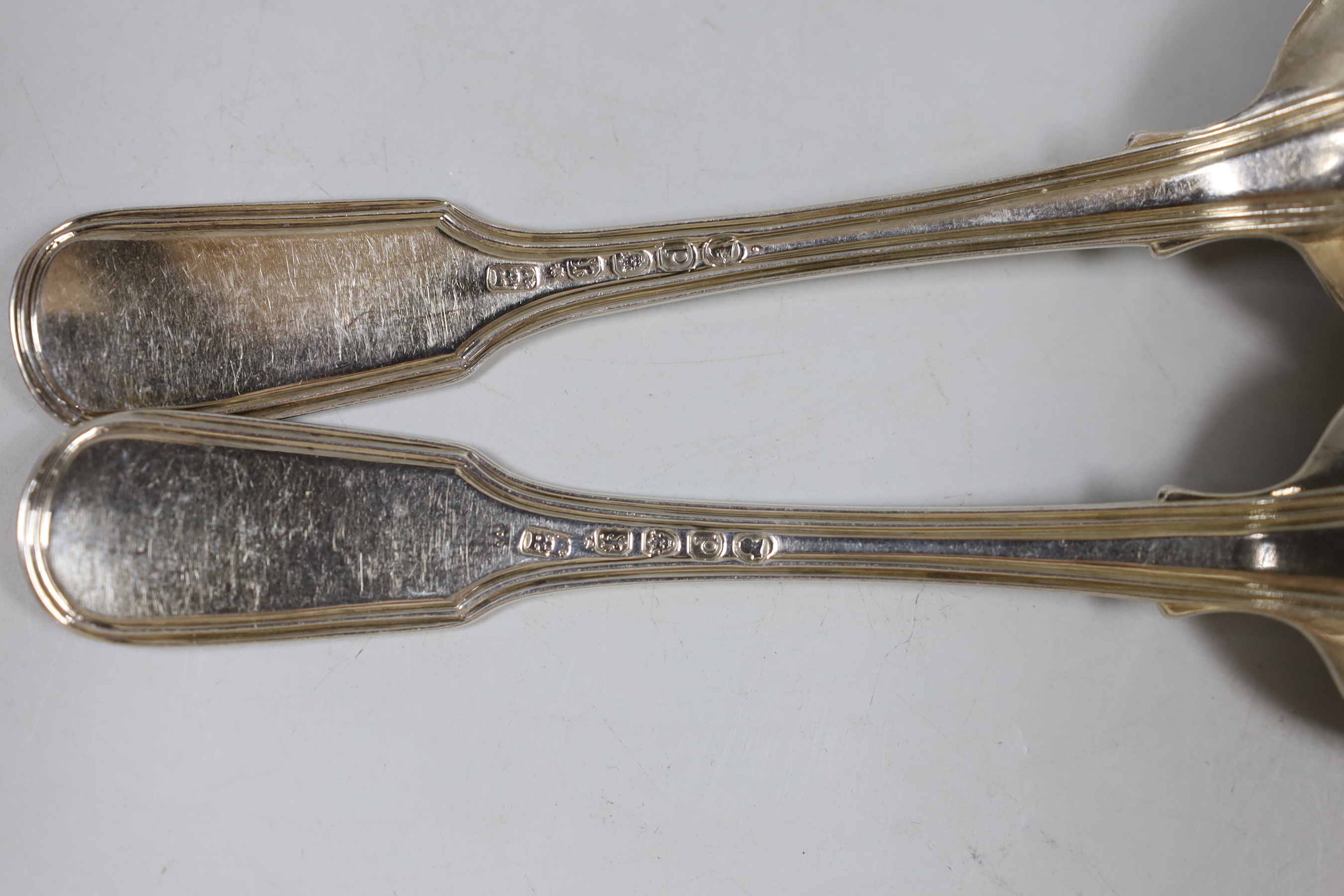 A set of six Victorian silver fiddle, thread and shell pattern dessert spoons, George Wintle, London, 1853 and six similar dessert spoons, 18.3oz.